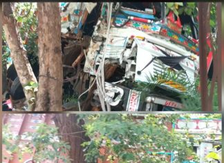 रेलवे माल गोदाम के पास लड़की को बचाने में ट्रक गड्ढे में घुसा, पेड़ से टकराया—चालक गंभीर